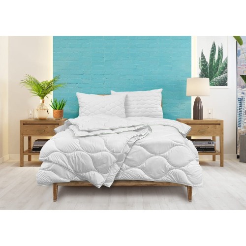 Kołdra 140x200 ALOE VERA całoroczna w sypialni na łóżku