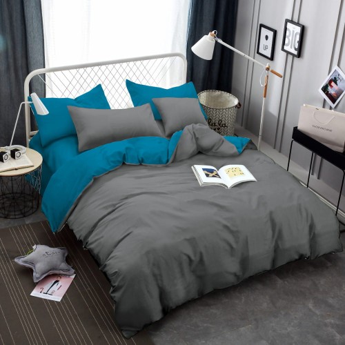 Turkusowa i szara pościel dwustronna na łóżku